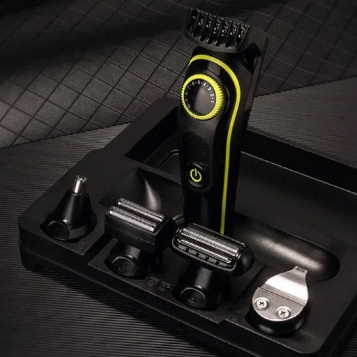 Багатофункціональна бритва Kemei KM-696: акумуляторний триммер з насадками для бороди та волосся