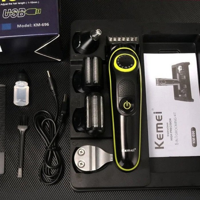 Багатофункціональна бритва Kemei KM-696: акумуляторний триммер з насадками для бороди та волосся