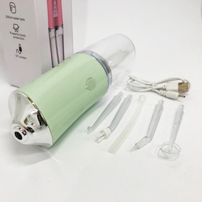 Іригатор для чищення зубів та порожнини рота Oral Irrigator з акумулятором та змінними насадками. Колір: зелений
