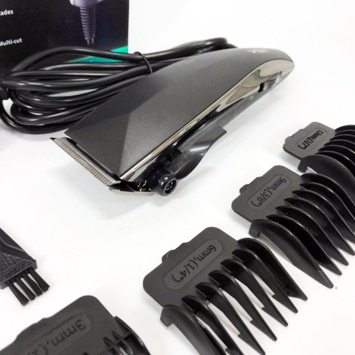 Професійна машинка для стрижки волосся VGR V-033 з функцією тримера та 4 насадками