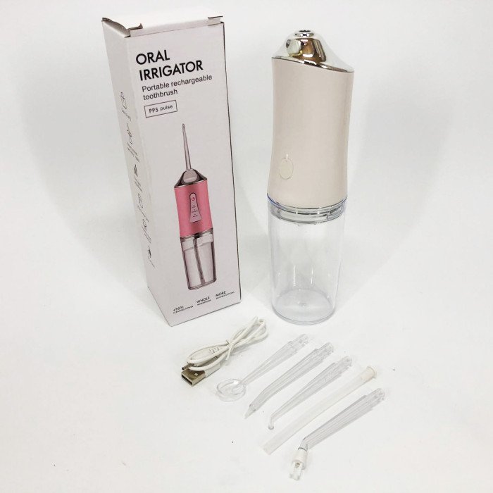 Іригатор для чищення зубів та порожнини рота Oral Irrigator з акумулятором та змінними насадками. Колір: білий