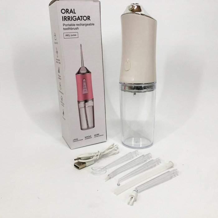 Іригатор для чищення зубів та порожнини рота Oral Irrigator з акумулятором та змінними насадками. Колір: білий