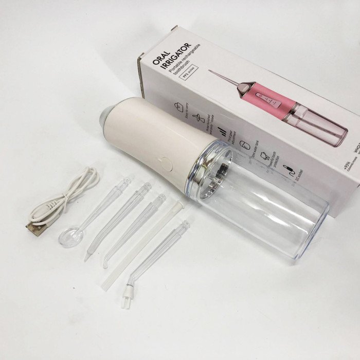 Іригатор для чищення зубів та порожнини рота Oral Irrigator з акумулятором та змінними насадками. Колір: білий