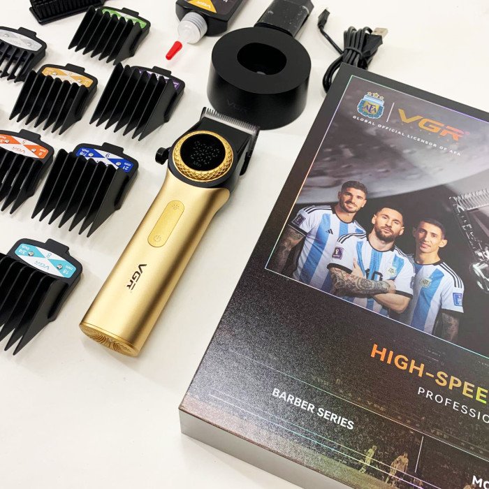 Професійна машинка для стрижки волосся VGR V-001 з дисплеєм 9000 об/хв та 10 насадками. Колір: золотий