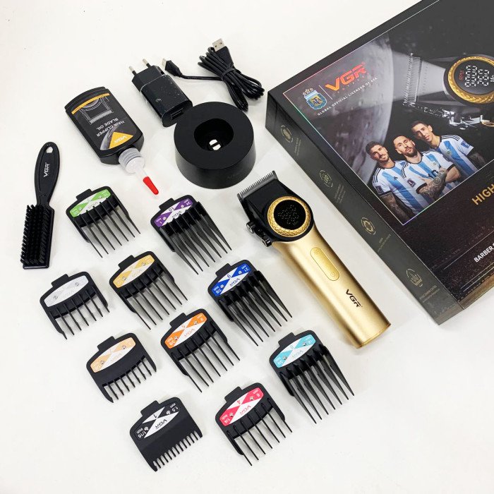 Професійна машинка для стрижки волосся VGR V-001 з дисплеєм 9000 об/хв та 10 насадками. Колір: золотий