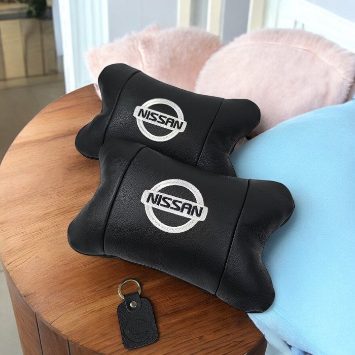 Подушки в авто 2 шт Nissan, натуральна шкіра, з логотипом Ніссан, на підголівник для вашої машини