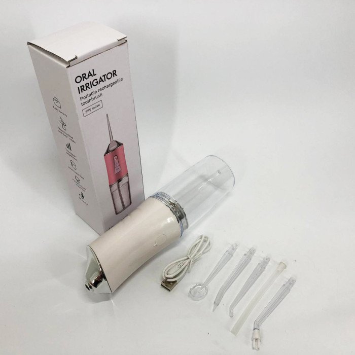 Іригатор для чищення зубів та порожнини рота Oral Irrigator з акумулятором та змінними насадками. Колір: білий