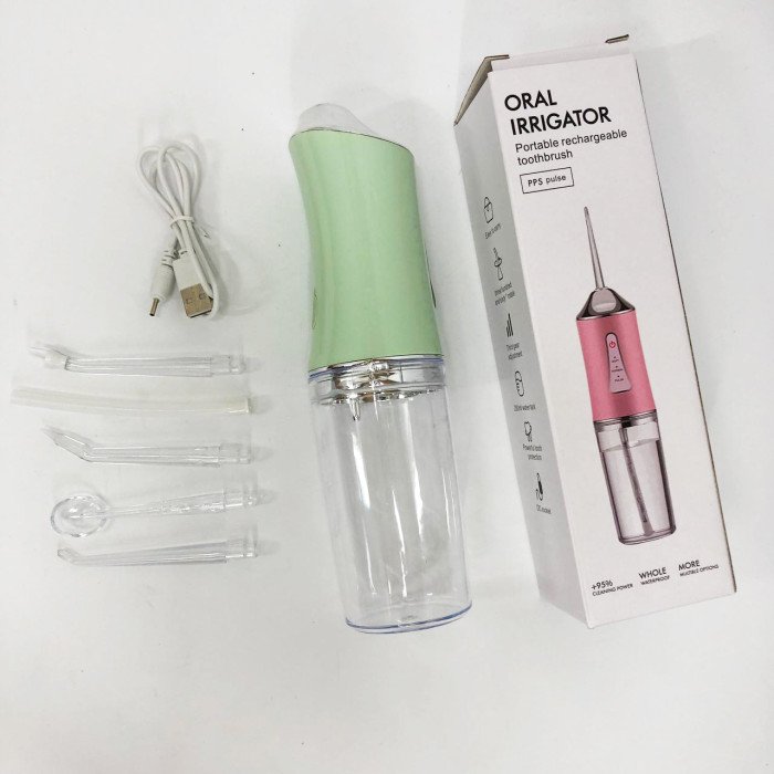 Іригатор для чищення зубів та порожнини рота Oral Irrigator з акумулятором та змінними насадками. Колір: зелений
