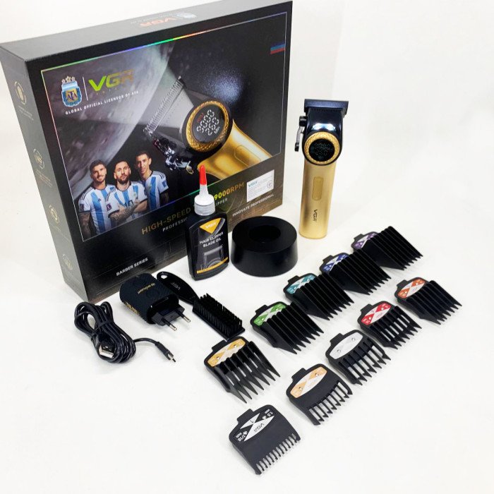 Професійна машинка для стрижки волосся VGR V-001 з дисплеєм 9000 об/хв та 10 насадками. Колір: золотий