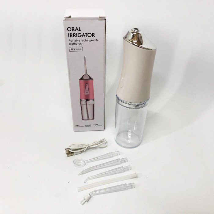 Іригатор для чищення зубів та порожнини рота Oral Irrigator з акумулятором та змінними насадками. Колір: білий