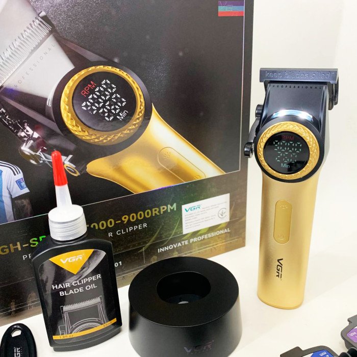 Професійна машинка для стрижки волосся VGR V-001 з дисплеєм 9000 об/хв та 10 насадками. Колір: золотий