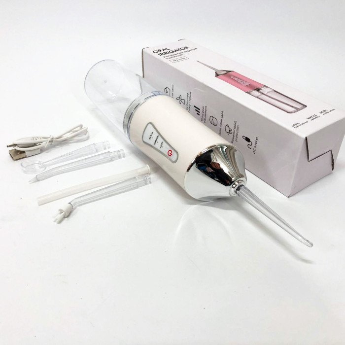 Іригатор для чищення зубів та порожнини рота Oral Irrigator з акумулятором та змінними насадками. Колір: білий