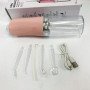 Іригатор для чищення зубів та порожнини рота Oral Irrigator з акумулятором та змінними насадками. Колір: рожевий