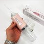 Іригатор для чищення зубів та порожнини рота Oral Irrigator з акумулятором та змінними насадками. Колір: рожевий