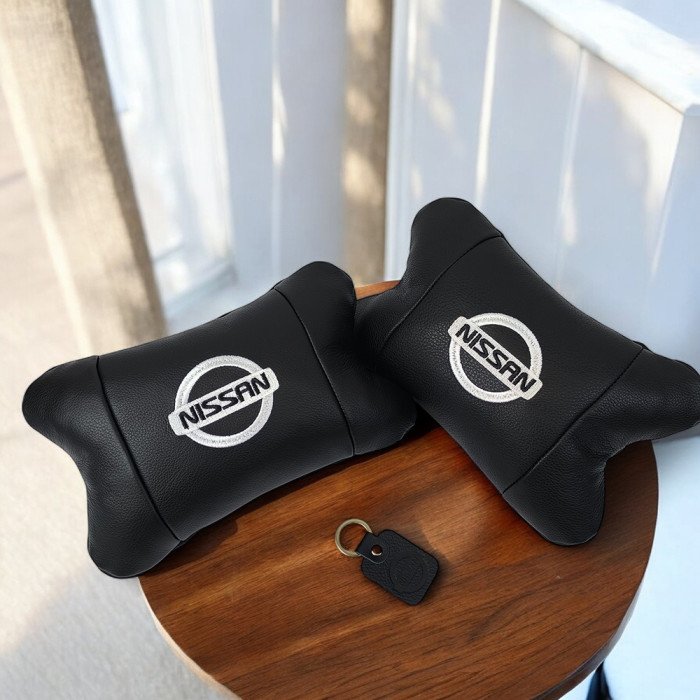 Подушки в авто 2 шт Nissan, натуральна шкіра, з логотипом Ніссан, на підголівник для вашої машини