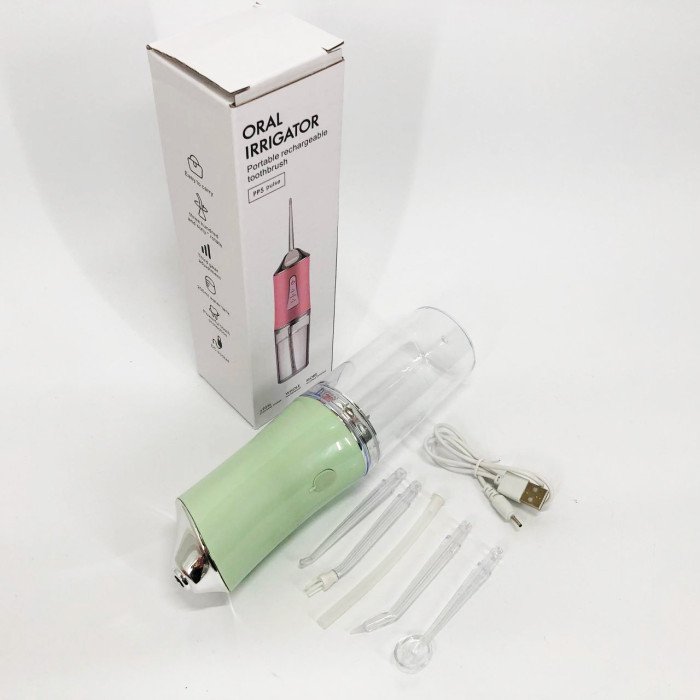 Іригатор для чищення зубів та порожнини рота Oral Irrigator з акумулятором та змінними насадками. Колір: зелений
