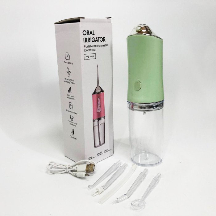 Іригатор для чищення зубів та порожнини рота Oral Irrigator з акумулятором та змінними насадками. Колір: зелений