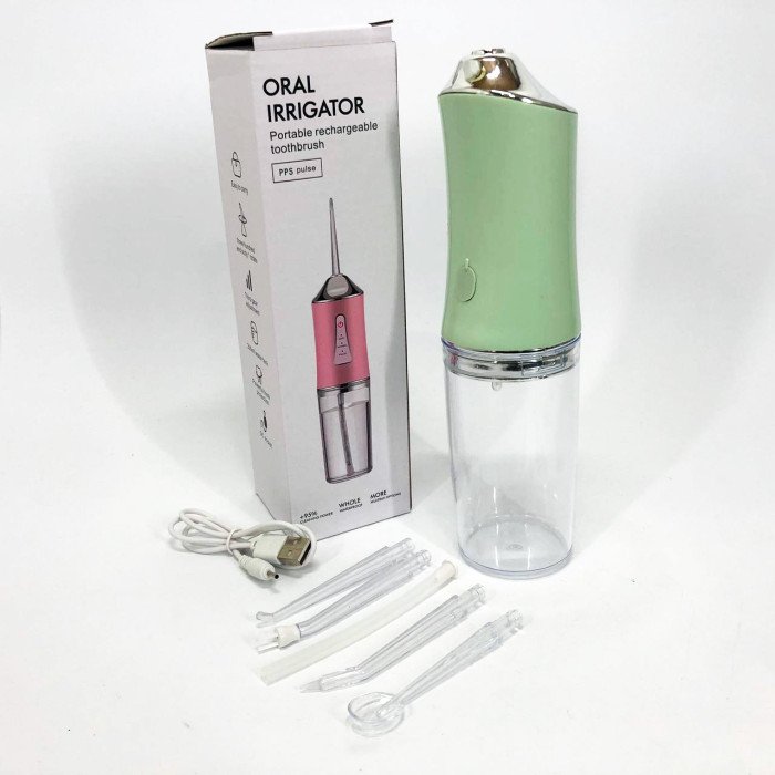 Іригатор для чищення зубів та порожнини рота Oral Irrigator з акумулятором та змінними насадками. Колір: зелений